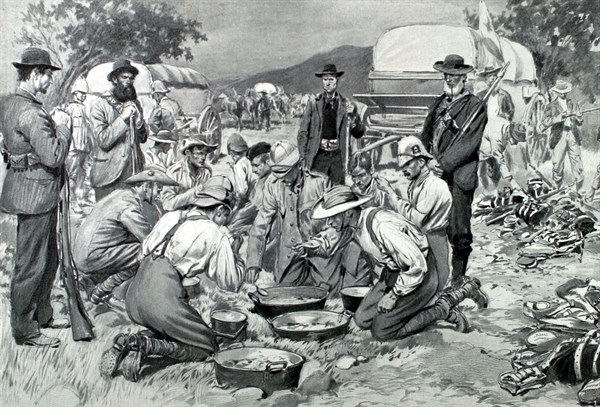 Guerre du Transvaal. Prisonniers anglais prenant leur repas au camp boer (1901)