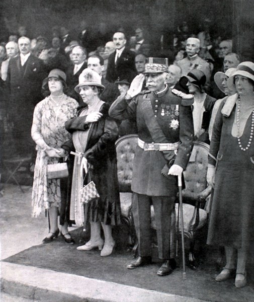 At Chantilly, on the day of the inauguration of his statue, marshal Joffre salutes the cheering crowd (1930)