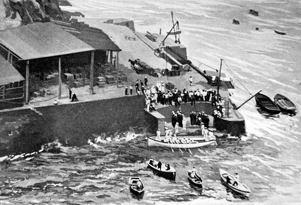 Boer War. 
Boer prisoners landing at Ste. Helene, in 1900