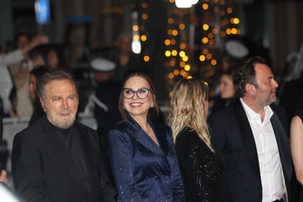 Franco Nero, Ornella Muti (in Solangel), Isabella Ferrari (in custom Saint Laurent), attend the