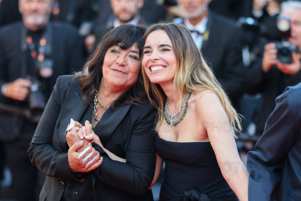 Romane Bohringer and Elodie Bouchez (in Saint Laurent) attend the "Histoires De La Nuit" (The
