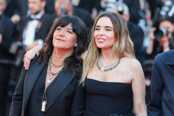 Romane Bohringer and Elodie Bouchez (in Saint Laurent) attend the "Histoires De La Nuit" (The