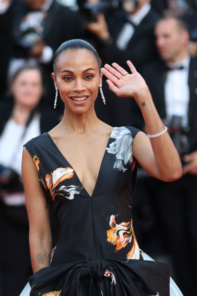 Zoe Saldaña (in Chanel) attends the closing ceremony of the 79th annual Cannes Film Festival at