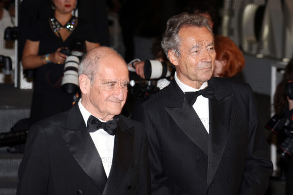 Michel Denisot and Pierre Lescure attend the "Coward" screening during the 79th annual Cannes Film