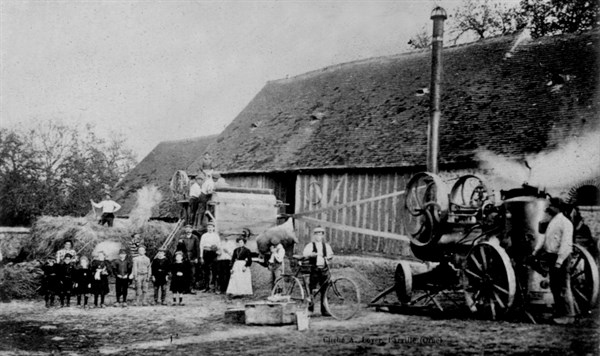 Beating out wheat on a farm in the department of Eure