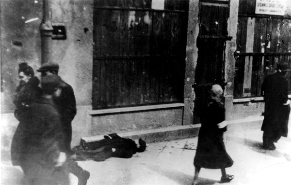 Ghetto in Warsaw. Man who died of hunger in the street