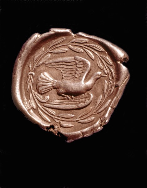Revers d'une monnaie en argent figurant une colombe dans une couronne de laurier
