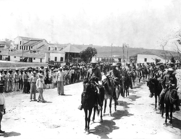 During a strike, workers going to work under police