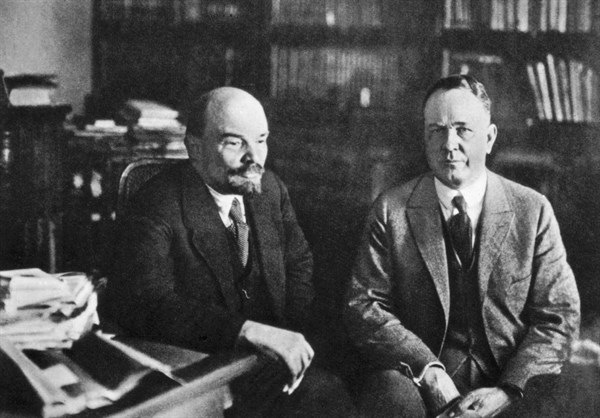 Moscow. Lenin talking with American economist Christensen, in his office