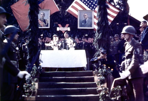 General Lewis A. Pick thanking the cheering crowd after the arrival of the 1st convoy which traveled on Stillwell Road.
