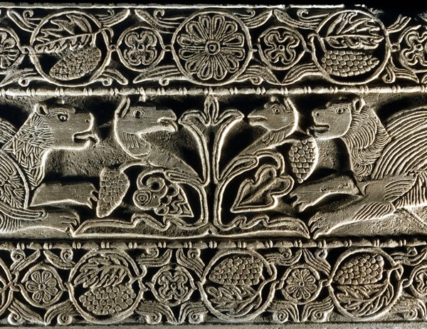Animals facing each other around the tree of life (detail)