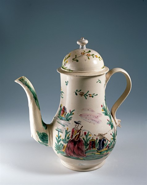 Painted coffee pot depicting a woman playing an instrument