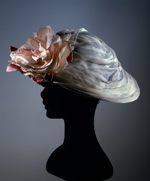 Ice-coloured synthetic satin "Modello" cloche with large flower made from organdie