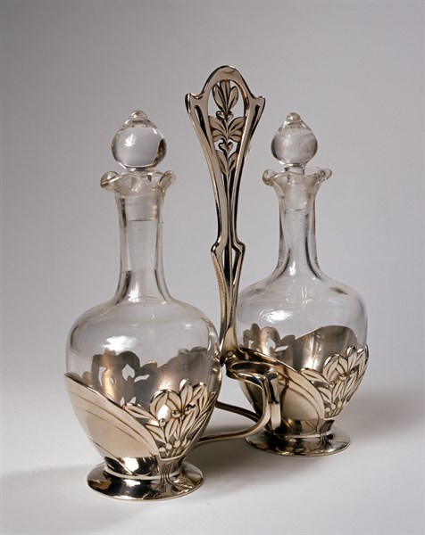 Two bottles and silver metal structure.