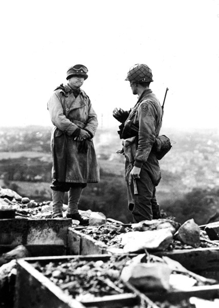 American General views the harbor of Cherbourg, June 27, 1944