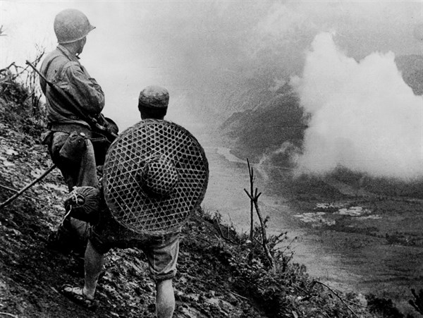 American and Chinese soldier  observe Salween River battle, 1944