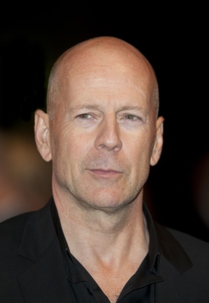 Bruce Willis with Dame Helen Mirren arriving for the European  Premiere of the film RED at the