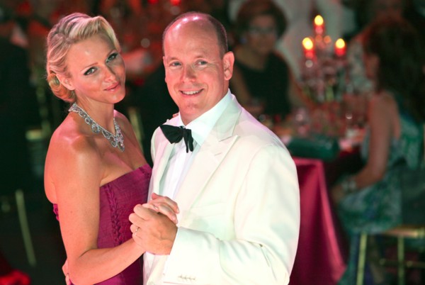 Prince Albert II of Monaco and his wife, Princess Charlene of Monaco, dance at the 63rd Red Cross