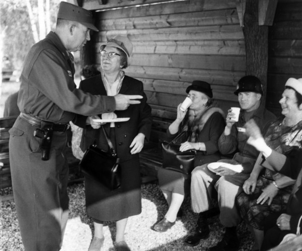 US General Hartel welcomes first visitors in American refuge huts in Berlin Grunewald