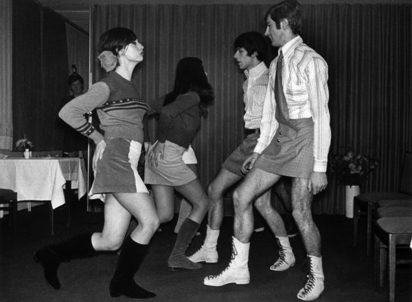 A group of young models, male and female, present themselves in mini skirts on 6 December 1966 in