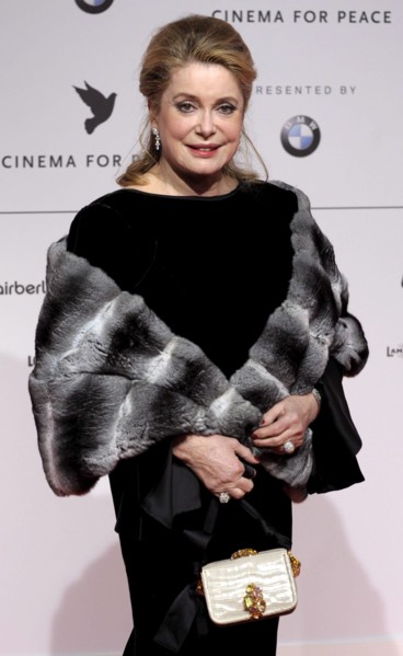 French actess Catherine Deneuve arrives at the 'Cinema
for Peace' gala at the 59th Berlin