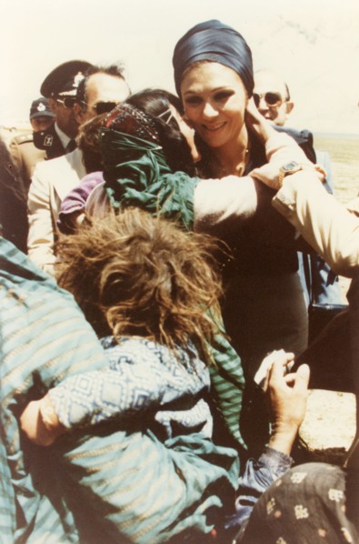 Farah Pahlavi visitng the country side