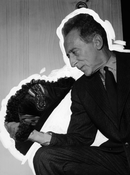 Cocteau holding his cocked hat, the members of the French Académie's typical hat, May 1959