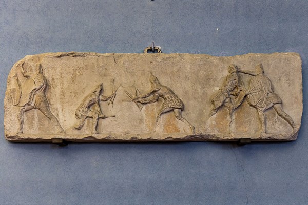 Roman slab representing a Sagittarii fighting
