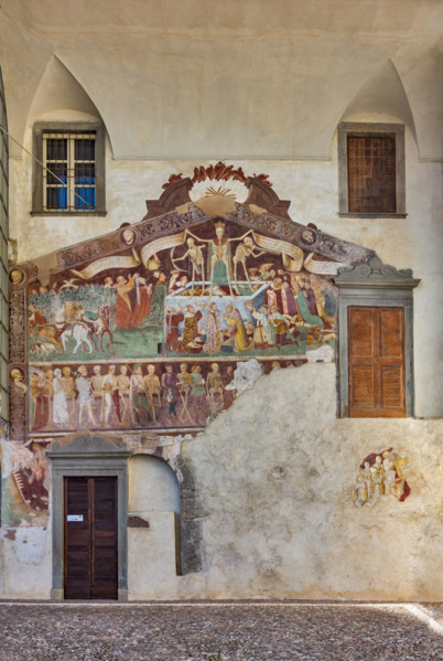 Clusone, Oratory of Disciplini or St. Bernardino, façade: frescoes with the Triumph of Death on