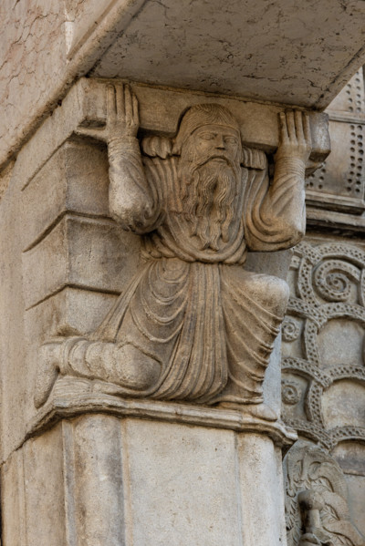 Fidenza, Duomo (St. Donnino Cathedral), the façade, the main portal, the prothyrum: the left