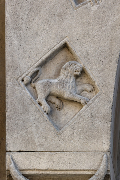 Fidenza, Duomo (St. Donnino Cathedral),facade, left portal, prothyrum, series of lozenges with