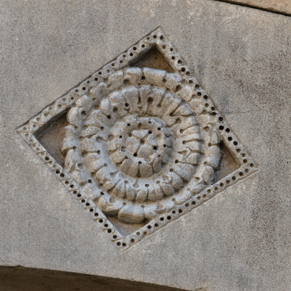 Fidenza, Duomo (St. Donnino Cathedral),facade, left portal, prothyrum, series of lozenges with