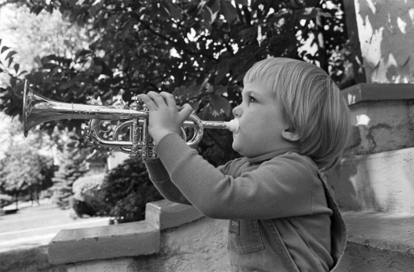 Young Boy Playing Trumpet