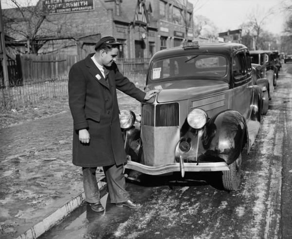 Man Leaning on Taxi Cab that has Heated Sign in Window, USA, Harris & Ewing, 1936
