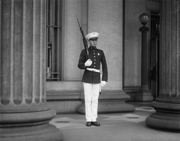 U.S. Marine Standing Guard at U.S. Treasury During Ku Klux Klan Parade, Washington DC, USA, Harris & Ewing, 1925