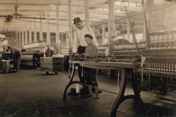 Young "Band-Boy" and Overseer, Yarn Mill, Yazoo City, Mississippi, USA, Lewis Hine, 1911