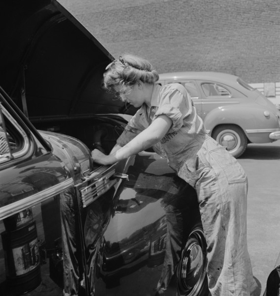Miss Natalie O'Donald, a Garage Attendant at the Atlantic Refining Company Garages, Philadelphia, Pennsylvania, USA, Jack Delano for Office of War Information, June 1943