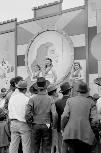 Crowd Watching Girlie Show at Carnival, Brownsville, Texas, USA, Arthur Rothstein for Farm Security Administration (FSA), February 1942