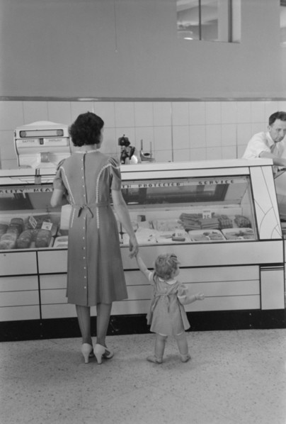Mother with Child Shopping in Co-Op Store, Greenbelt, Maryland, USA, Marion Post Wolcott for Farm Security Administration, September 1938