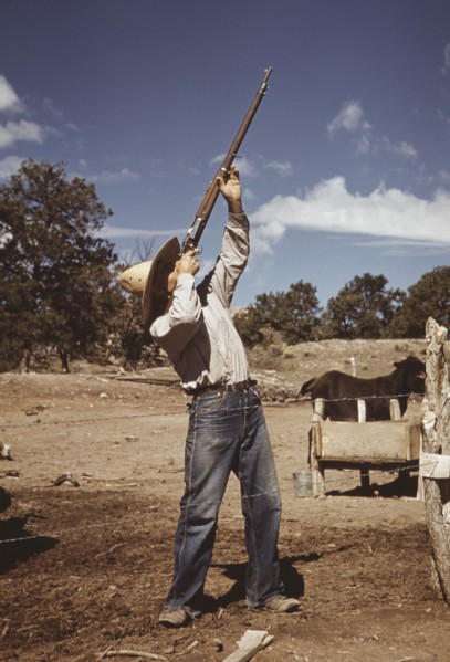 Homesteader Shooting at Hawks, Pie Town, New Mexico, USA, Lee Russell for Farm Security Administration, October 1940