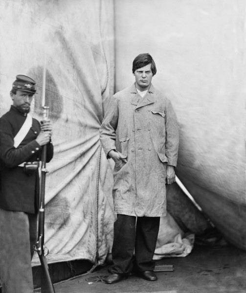 Lewis Powell, also known as Lewis Payne, Attacker of U.S. Secretary of State William H. Seward, and Conspirator in Assassination of U.S. President Abraham Lincoln, Standing in Overcoat, Washington Nav...