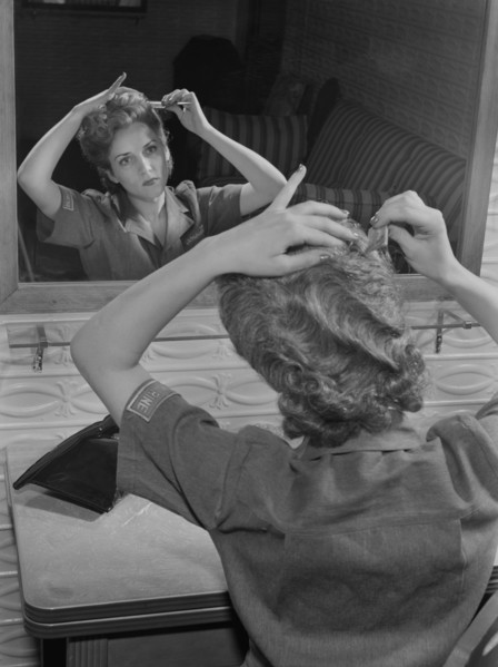 Female Worker Styling her Short Hair for Safe Industrial Work during World War II, Bendix Aviation Plant, Brooklyn, New York, USA, Ann Rosener for Office of War Information, March 1943