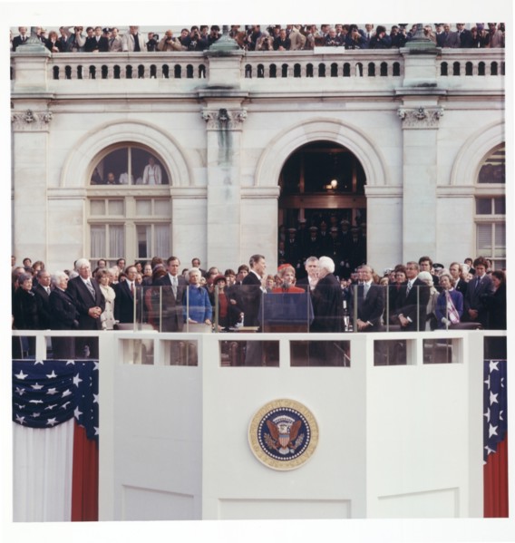 Chief Justice Warren E. Burger administering the oath of office to Ronald Reagan on the east portico of the U.S. Capitol, Washington DC, USA, Architect of the Capitol, January 20, 1981