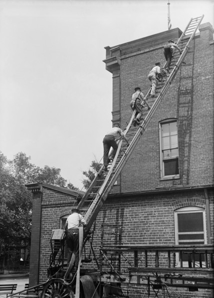Firemen Climbing Ladder onto Building, Firemen's School, Washington DC, USA, Harris & Ewing, 1921