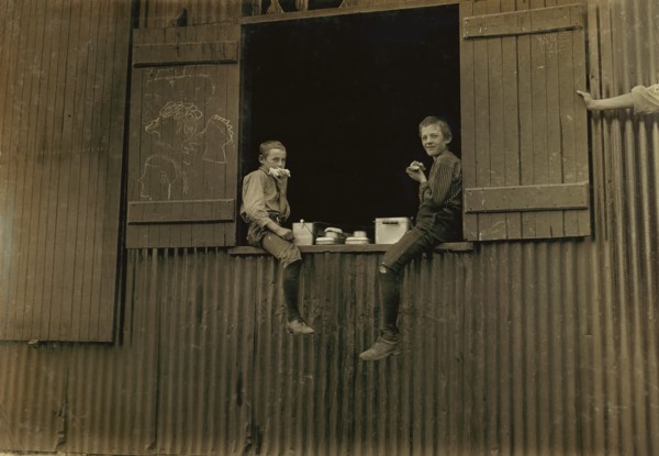 Two Young Boys eating Lunch, Economy Glass Works, Morgantown, West Virginia, USA, Lewis Hine for National Child Labor Committee, October 1908