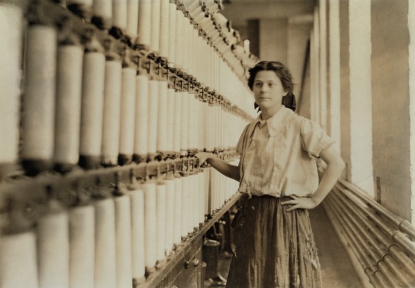 Anna Grenier, at her "Speeder", Chace Cotton Mill, Burlington, Vermont, USA, Lewis Hine for National Child Labor Committee, May 1909