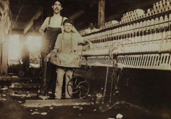 Young "Tube Boy" with Injured Finger and Overseer in Mule Room, Richmond Spinning Mill, East Lake, Chattanooga, Tennessee, USA, Lewis Hine for National Child Labor Committee, December 1910