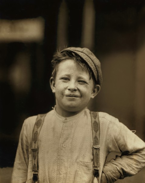 Donald "Happy" Mallick, 9-year-old Newsboy, has been selling Newspaper for 5 years, Half-Length Portrait, Wilmington, Delaware, USA, Lewis Hine for National Child Labor Committee, May 1910