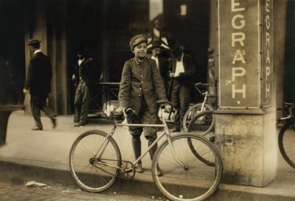 Postal Telegraph Messenger, Portrait Standing with Bicycle at Sidewalk, Birmingham, Alabama, USA, Lewis Hine for National Child Labor Committee, November 1910