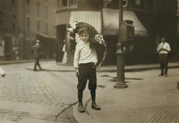 Vitto Romano, 12 years old, Carrying Load of Garments, Boston, Massachusetts, USA, Lewis Hine for National Child Labor Committee, August 1912